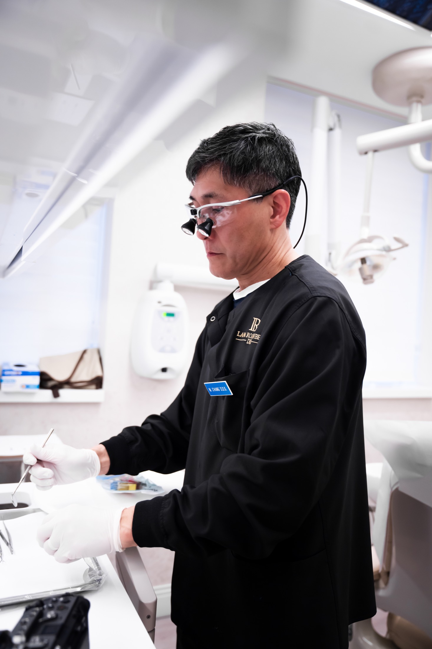 Dr. Michael Chang treating a patient at Rozenberg Dental, Midtown NYC